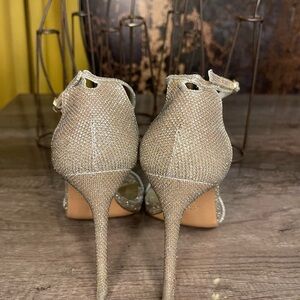 Stuart Weitzman high heels.